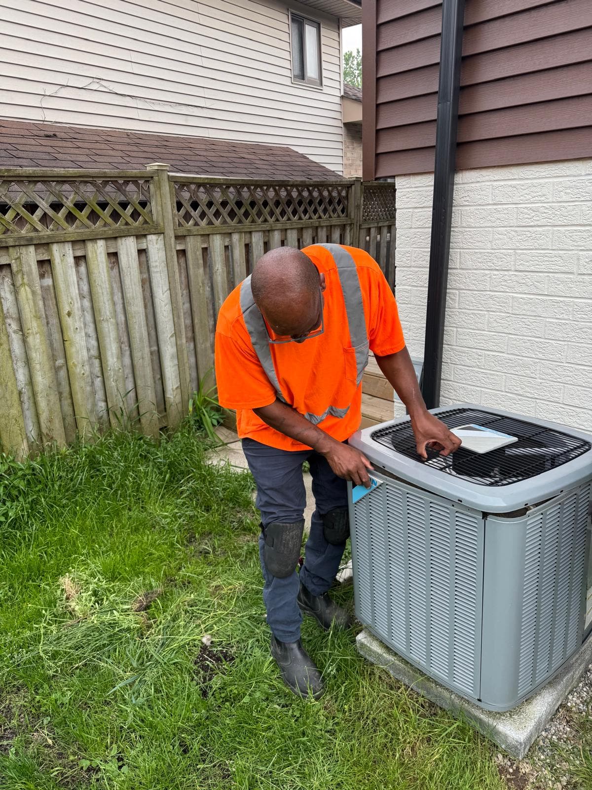 Outdoor condensing unit serviced by QP HVAC